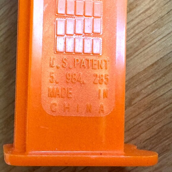 PEZ Candy Dispenser Meet the Robinsons Bowler Hat Guy, Orange Stem, China, 2007 - Picture 14 of 16